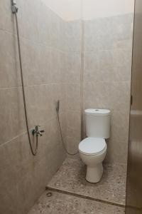 Koupelna v ubytování OYO 93623 Assalam Homestay Syariah