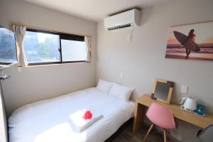 最高の夏にするための特別割引 海外のようなロケーションのコンテナ型ホテル客房内的一张或多张床位