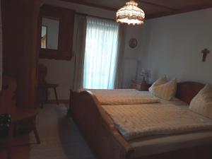 Postel nebo postele na pokoji v ubytování Ferienhaus Axmann