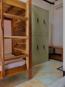 a bunk bed room with two bunk beds at Hello Hostel in San Vicente