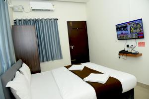 Imagem da galeria de Hotel Aradhya Inn Deralakatte em Mangalore mais 47 fotografias
