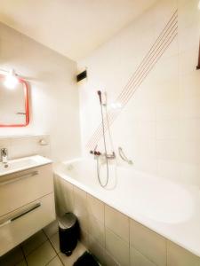 a bathroom with a shower and a sink at Verbier Appartement Andrea in Verbier