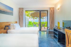 TV a/nebo společenská místnost v ubytování Temple Da Nang Resort