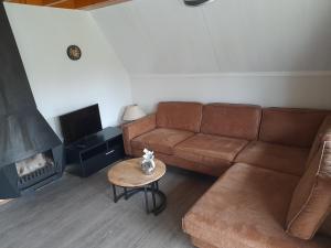 Posezení v ubytování t'Hoog Holt