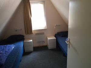 Posezení v ubytování t'Hoog Holt + 1 fotografie