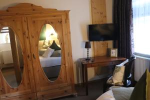 Ένα ή περισσότερα κρεβάτια σε δωμάτιο στο Hotel Kropper Busch Garni