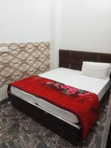 Posteľ alebo postele v izbe v ubytovaní Hotel Indian Ldh