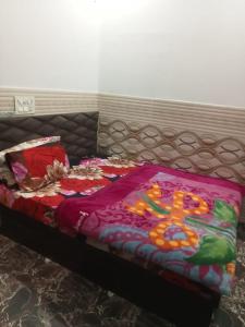 Posteľ alebo postele v izbe v ubytovaní Hotel Indian Ldh