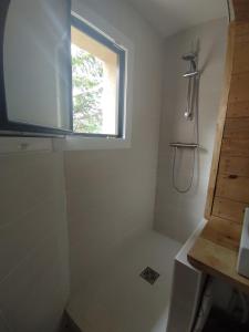 a bathroom with a shower and a window at Appartement T3 50m² - 6 pers. - Barcelonnette in Barcelonnette +23 photos