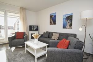 Posezení v ubytování Hafenhäuser Breege FeWo 05 - Balkon