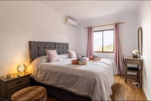Кровать или кровати в номере Apartamento Bela Vista Leni