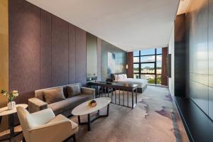 TV a/nebo společenská místnost v ubytování Mercure Shenzhen Longgang