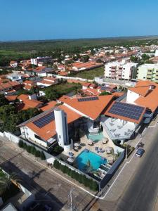 an overhead view of a building with solar panels on its roofs at Nautillus Hotel in Parnaíba
