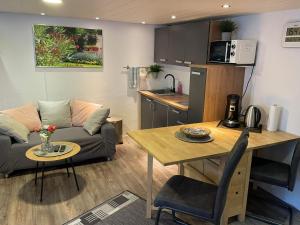 Kuchyň nebo kuchyňský kout v ubytování Apartment Mette