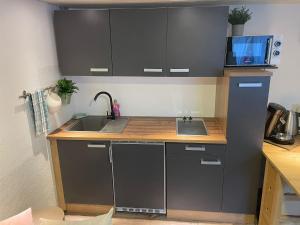 Kuchyň nebo kuchyňský kout v ubytování Apartment Mette