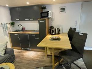 Kuchyň nebo kuchyňský kout v ubytování Apartment Mette