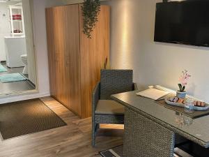TV a/nebo společenská místnost v ubytování Apartment Mette