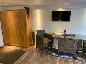 TV a/nebo společenská místnost v ubytování Apartment Mette