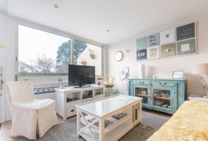 Et tv og/eller underholdning på Maison dans résidence calme + piscine à Pornic