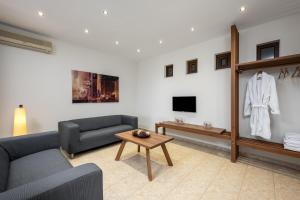 TV a/nebo společenská místnost v ubytování 3 Roses Residence