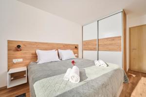 Postel nebo postele na pokoji v ubytování Apartma Morje