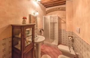 a bathroom with a sink and a toilet and a shower at Residence Il Gavillaccio in Figline Valdarno