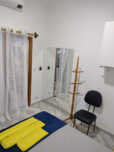 Cama ou camas em um quarto em Flat Duplo para sua conexão
