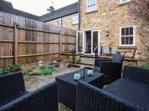 Ein Patio oder anderer Außenbereich in der Unterkunft Bumble Cottage + 17 Fotos