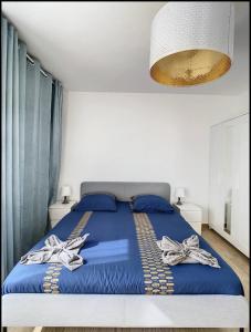 מיטה או מיטות בחדר ב-Livry04 Villa Dengous - Cozy Aéroport CDG Wifi 4 pers