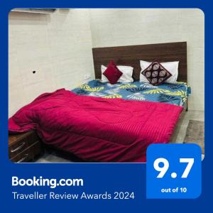 Posteľ alebo postele v izbe v ubytovaní OYO Hotel Mahima