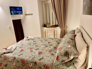 Krevet ili kreveti u jedinici u objektu Doppia Suite Pinzolo by Holiday World