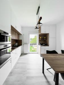 A kitchen or kitchenette at Ligeti Bástya Vendégház