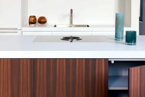 a kitchen with a sink and a white counter top at Brussels Splendor Suites in Brussels