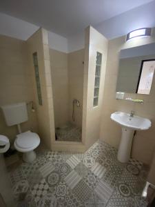 Phòng tắm tại Vila Leul
