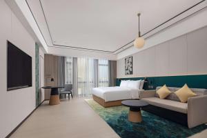 Μια τηλεόραση ή/και κέντρο ψυχαγωγίας στο Hilton Garden Inn Jiangmen Xinhui