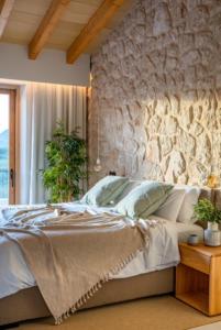 En eller flere senger på et rom på Luxury Villa Can Xanet