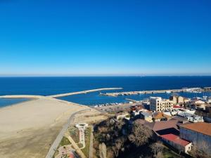 an aerial view of a beach and the ocean at Seaview Residence in Constanţa