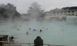 a group of people swimming in a fountain at Casa Lale in Corchiano