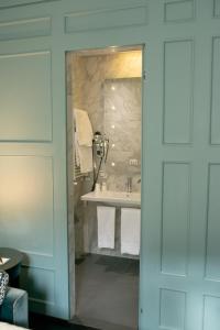 Vannituba majutusasutuses Stendhal Luxury Suites