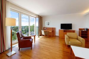 TV a/nebo společenská místnost v ubytování ATLANTIC Hotel Wilhelmshaven