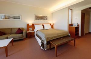 Postel nebo postele na pokoji v ubytování ATLANTIC Hotel Wilhelmshaven