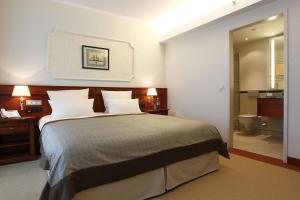 Postel nebo postele na pokoji v ubytování ATLANTIC Hotel Wilhelmshaven