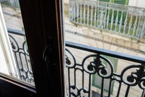 una finestra con vista da un balcone di Galatina Suites Boutique - Luxury Experience in Salento a Galatina