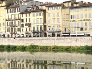 
a large body of water surrounded by buildings at Hotel Berchielli in Florence
