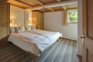 Postel nebo postele na pokoji v ubytování Apartments Styria