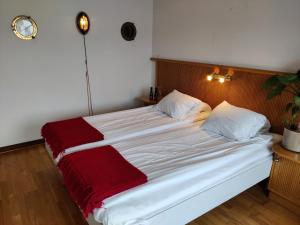 Postel nebo postele na pokoji v ubytování Hotell City