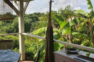 Vrt pred nastanitvijo Bungalow vue mer avec jardin
