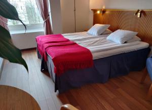 Postel nebo postele na pokoji v ubytování Hotell City