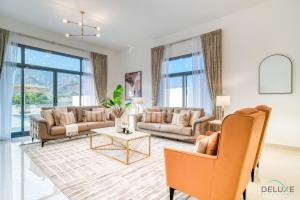 Oleskelutila majoituspaikassa High-end 4BR Villa with Assistant’s Room Al Dana Island, Fujairah by Deluxe Holiday Homes