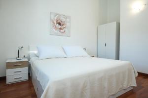 Postel nebo postele na pokoji v ubytování Apartments Seafront